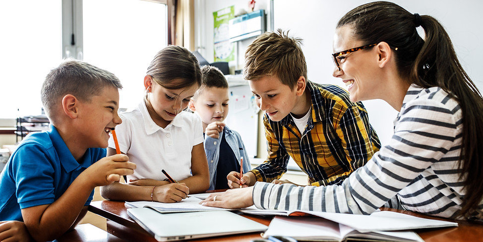 Children learning with teacher