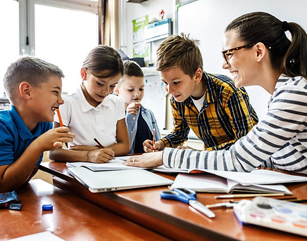 Children learning with teacher