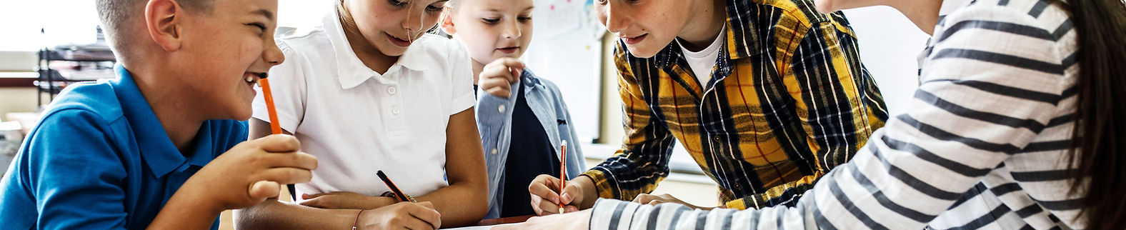 Children learning with teacher