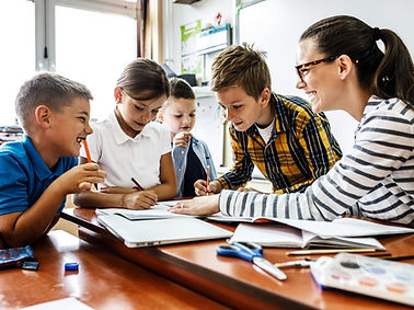 Children learning with teacher