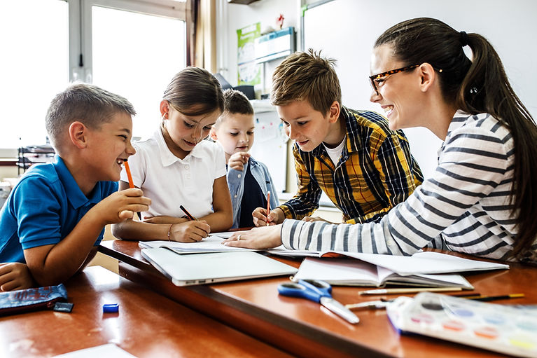 Children learning with teacher