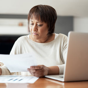 Professional Fiduciary Reviewing Documents