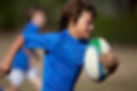 Courir avec un ballon de rugby