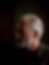 a man in a dark room who is in need of senior care