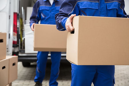 Men Carrying Packages