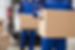 People Carrying Boxes