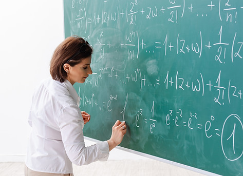 Female Teacher during a Math Class