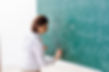 Female Teacher during a Math Class