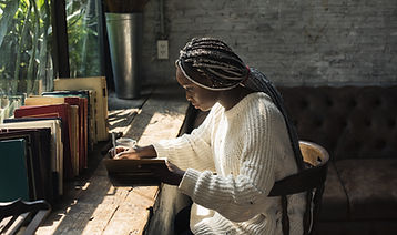 A Woman Writing by the Window