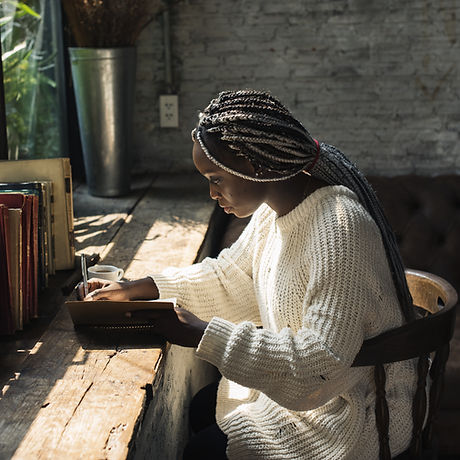 A Woman Writing by the Window