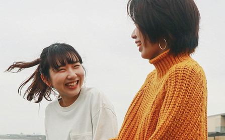 Two Women Smiling