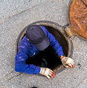 Worker in Manhole