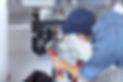 Plumber working on a plumbing job