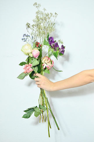 Hand Holding Bouquet