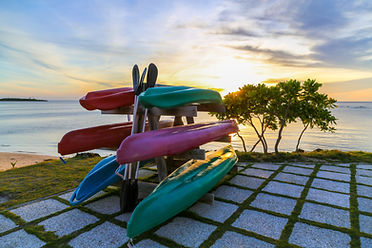 Stacked Kayaks Sunset