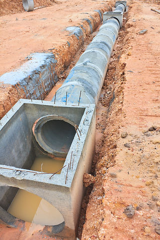 Concrete drainage tank on construction site