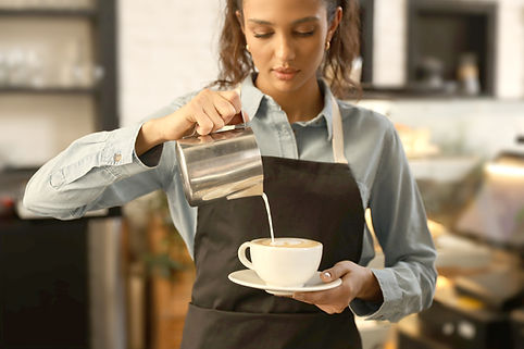 Barista Pouring Milk