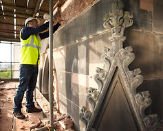 church being restored by stonemason