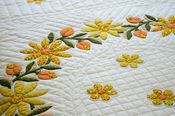 An embroidered bedspread