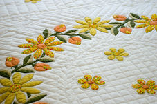 An embroidered bedspread