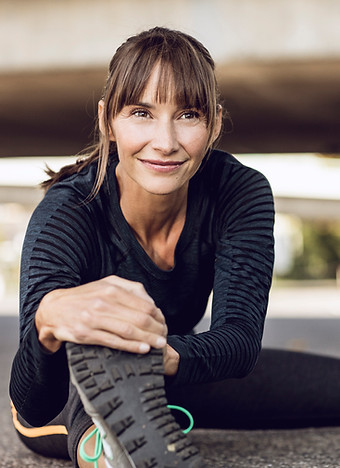 Fitness Training - woman stretching