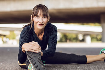 Woman stretching before a run.