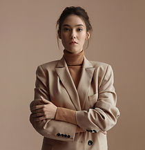 Woman In Beige Suit