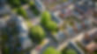 Aerial view of a modern housing development with solar panels installed on all the rooftop