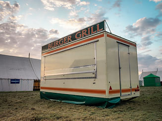 Burger and grill white and orange catering van