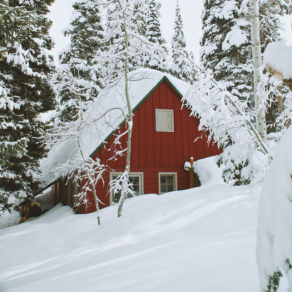Snow-Covered Red Cabin
