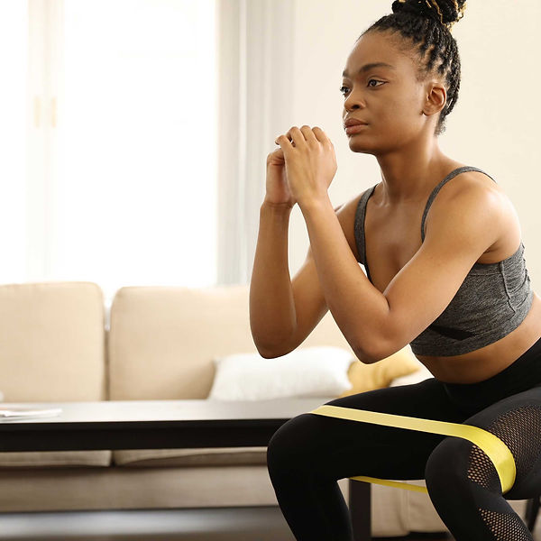 Woman Exercising Indoors