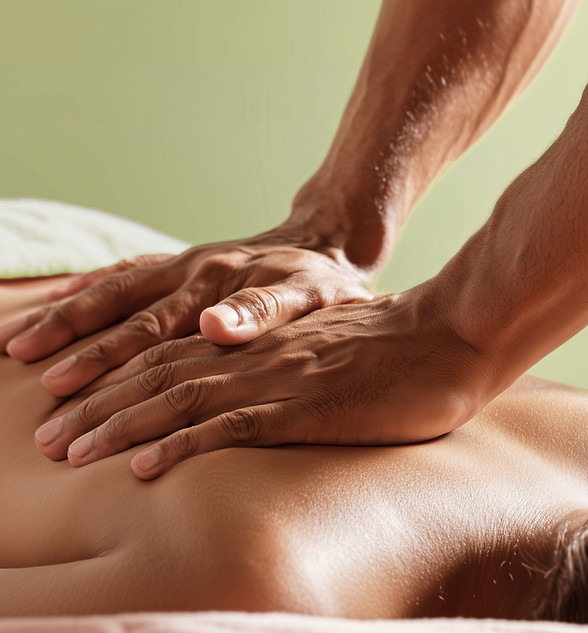 Massage therapist providing personalized massage therapy as part of ongoing wellness care