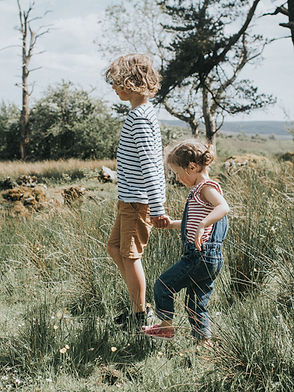 Children Walking Outdoors