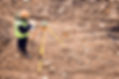 Surveyor on Construction Site