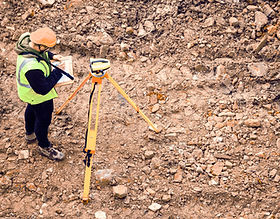 Surveyor on Construction Site