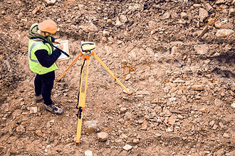 Surveyor on Construction Site