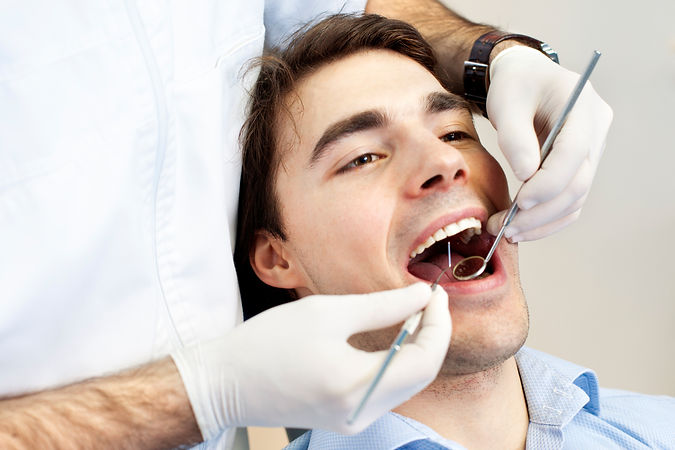 Close-up of a patient's open mouth during a dental check-up