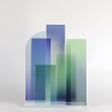 Glass business graphs in a geometric way blue and green