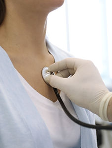 Doctor using stethoscope