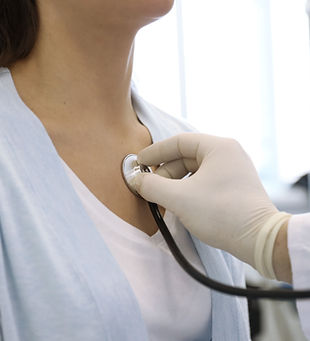 Doctor Examining Patient
