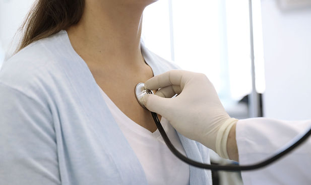 Doctor using stethoscope