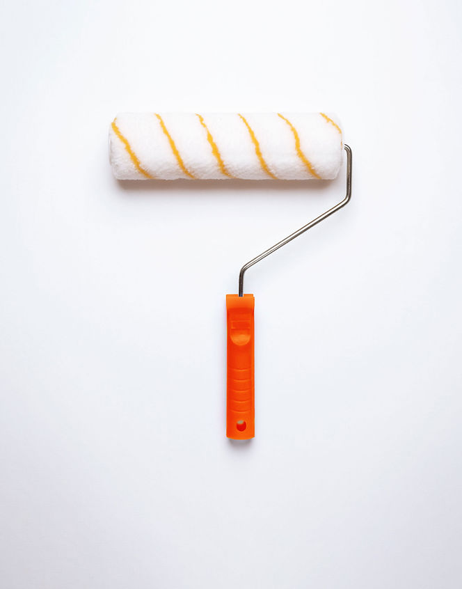 paintbrush and white wall