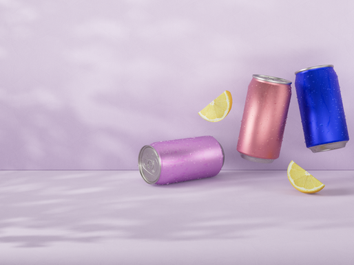 colourful metal cans against a purple background