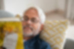 Senior reading a book