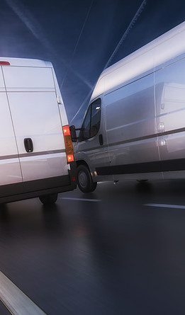 3d design of Vans in motion on highway