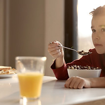 Child Eating Breakfast