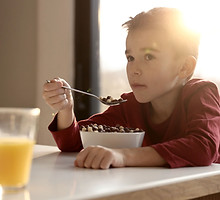 Boy Eating Breakfast
