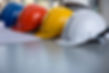 Close-Up Of Hardhats On Table