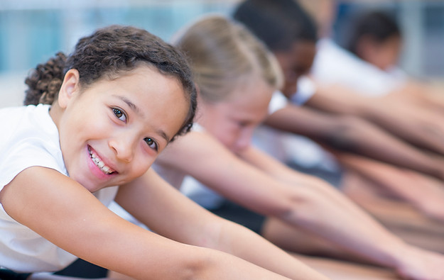 Children Stretching Together
