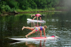 SUP Yoga Couple at Lake